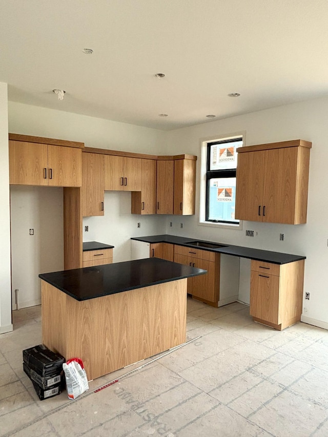 3676 Meadow Sage Ct SE, Rochester, MN 55904 - kitchen featuring a kitchen island and dark countertops