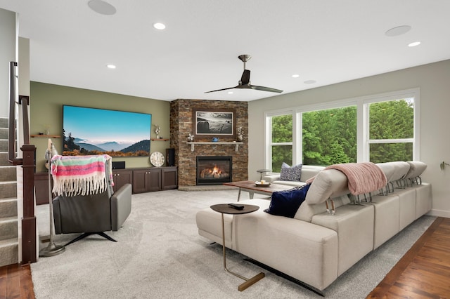 4965 250th St, Elko New Market, MN 55020 - living room with ceiling fan, a fireplace, wood finished floors, recessed lighting, and stairs