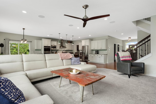 4965 250th St, Elko New Market, MN 55020 - living area featuring ceiling fan, stairway, and recessed lighting