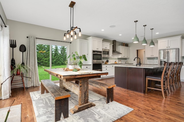 4965 250th St, Elko New Market, MN 55020 - dining area with hardwood / wood-style flooring and recessed lighting
