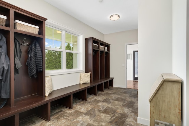 4965 250th St, Elko New Market, MN 55020 - mudroom featuring baseboards and stone finish flooring