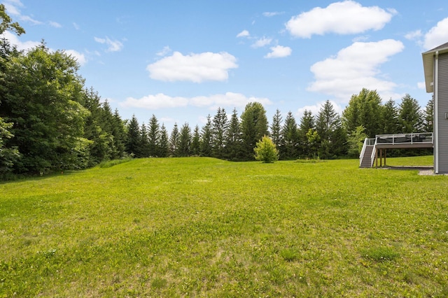 4965 250th St, Elko New Market, MN 55020 - view of grassy yard with a deck and stairway