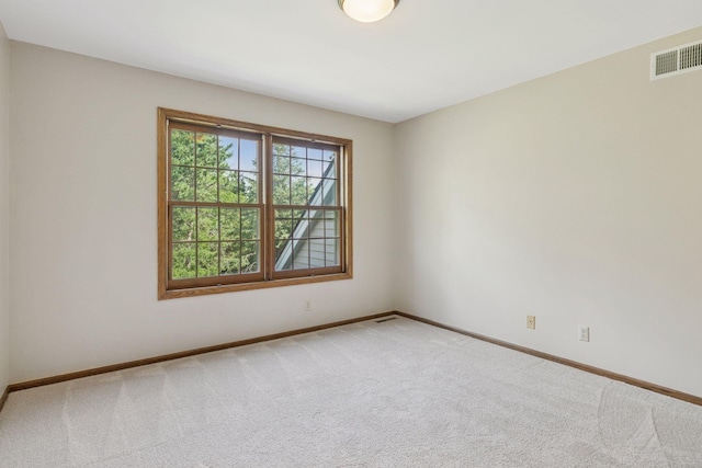 10636 Purdey Rd, Eden Prairie, MN 55347 - spare room with baseboards and light colored carpet