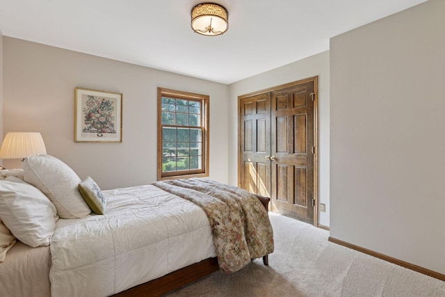 10636 Purdey Rd, Eden Prairie, MN 55347 - carpeted bedroom with baseboards and a closet