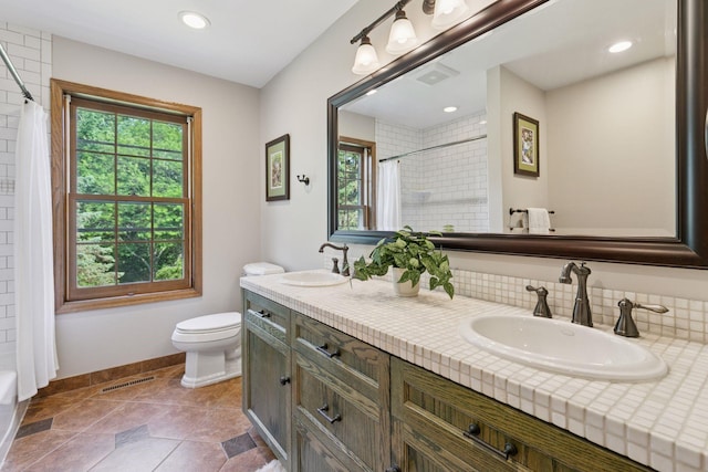 10636 Purdey Rd, Eden Prairie, MN 55347 - full bathroom with double vanity and recessed lighting