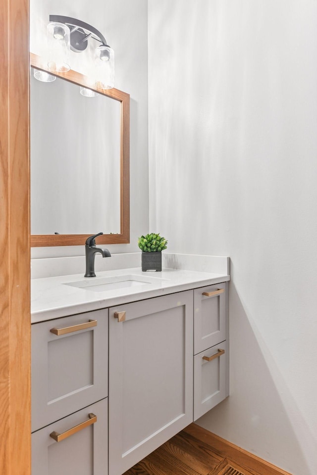 2061 Langston Ln NE, Saint Michael, MN 55376 - bathroom with vanity and wood finished floors