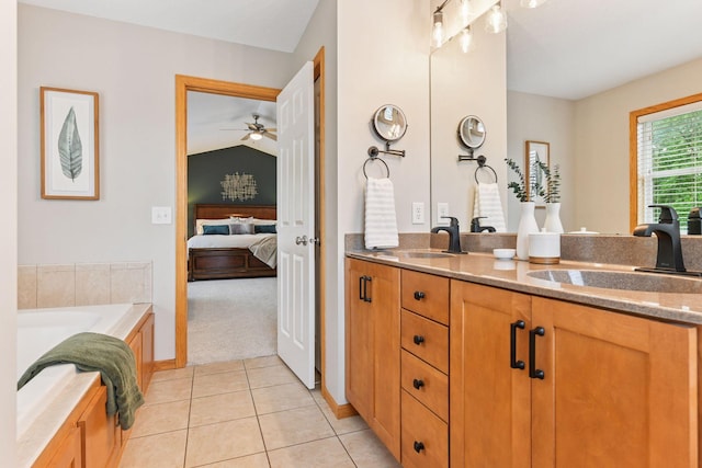 2061 Langston Ln NE, Saint Michael, MN 55376 - bathroom featuring ensuite bath, double vanity, tile patterned floors, a garden tub, and a ceiling fan