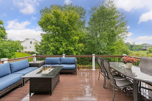 2061 Langston Ln NE, Saint Michael, MN 55376 - deck featuring an outdoor living space with a fire pit and outdoor dining area