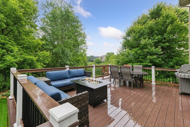 2061 Langston Ln NE, Saint Michael, MN 55376 - wooden terrace featuring an outdoor living space with a fire pit, outdoor dining area, and area for grilling
