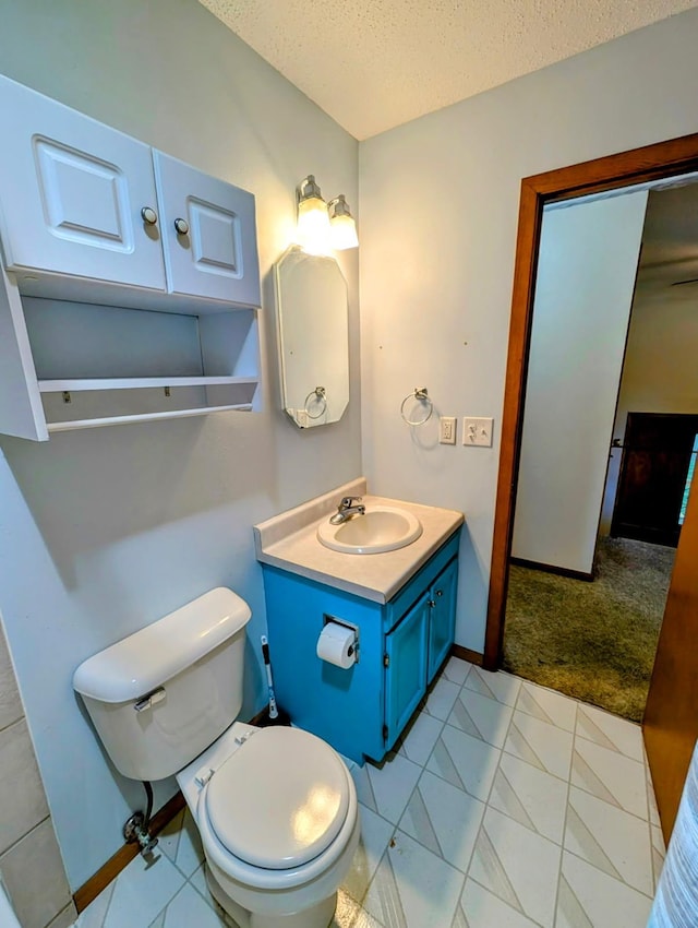 314 11th St, Montevideo, MN 56265 - bathroom featuring a textured ceiling and vanity