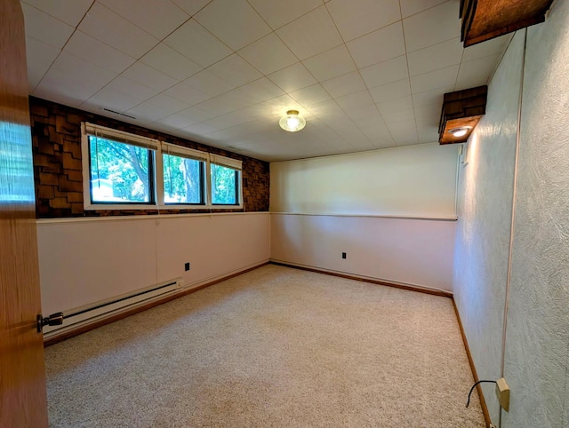 314 11th St, Montevideo, MN 56265 - carpeted spare room with a baseboard radiator and a textured wall