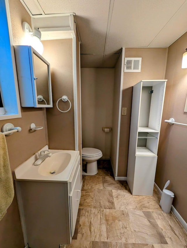 314 11th St, Montevideo, MN 56265 - bathroom featuring toilet and vanity