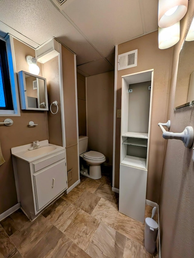314 11th St, Montevideo, MN 56265 - bathroom with vanity and toilet