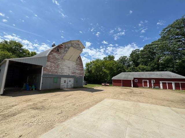 14717 State 210, Stowe Prairie Twp, MN 56453 - view of barn featuring dirt driveway