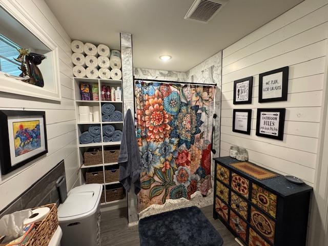 14717 State 210, Stowe Prairie Twp, MN 56453 - full bath featuring a shower with curtain and wood walls