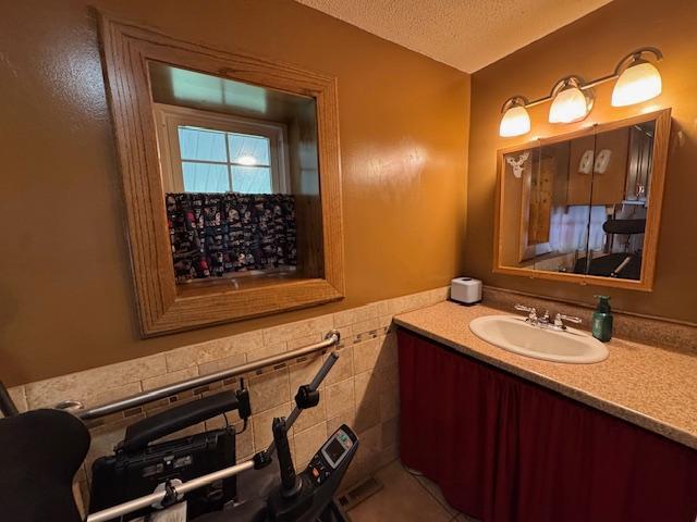 14717 State 210, Stowe Prairie Twp, MN 56453 - bathroom with vanity and a textured ceiling
