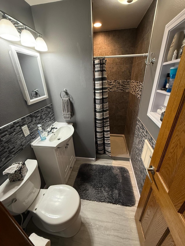 411 Vernon Ave, Morgan, MN 56266 - bathroom featuring a shower stall, vanity, and built in features