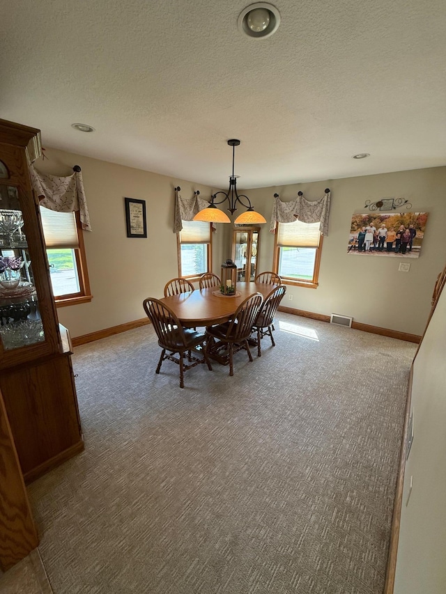 411 Vernon Ave, Morgan, MN 56266 - carpeted dining room with a textured ceiling and recessed lighting