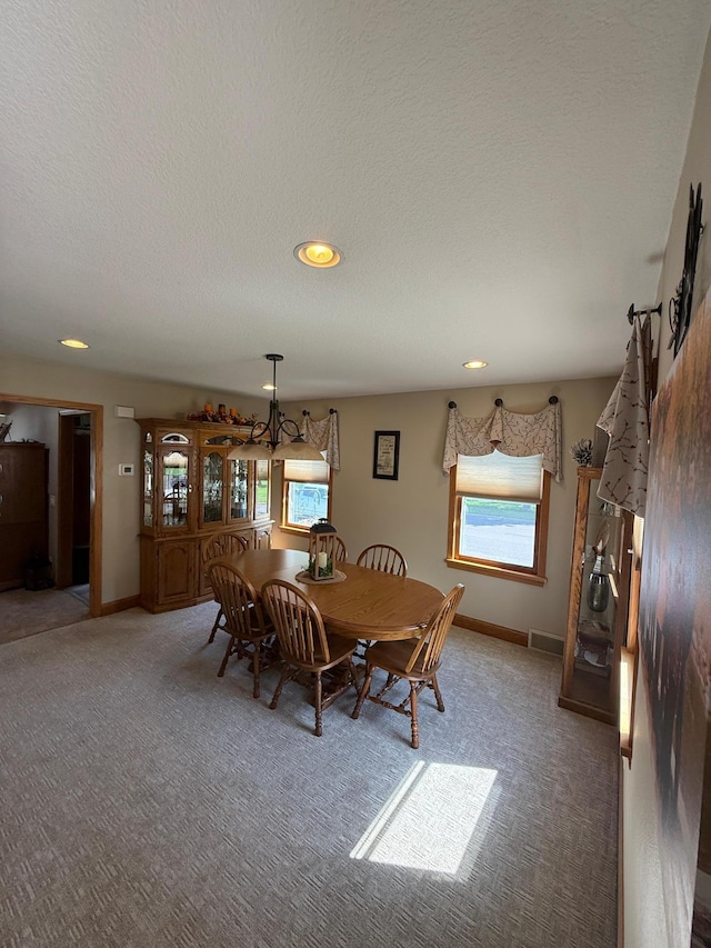 411 Vernon Ave, Morgan, MN 56266 - carpeted dining room featuring healthy amount of natural light and recessed lighting