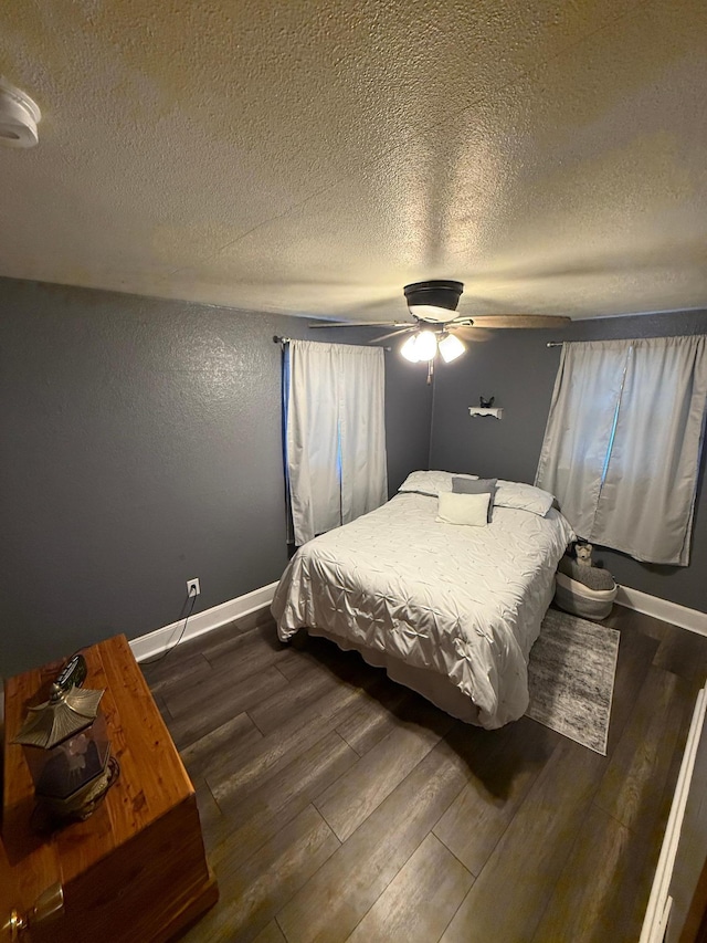 411 Vernon Ave, Morgan, MN 56266 - bedroom with dark wood finished floors, a textured ceiling, and ceiling fan