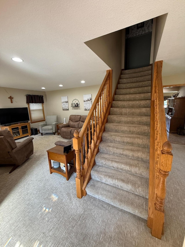 411 Vernon Ave, Morgan, MN 56266 - stairway with carpet flooring, recessed lighting, and a textured ceiling