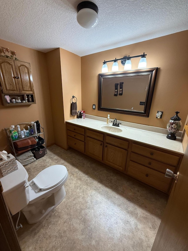 411 Vernon Ave, Morgan, MN 56266 - bathroom with vanity and a textured ceiling