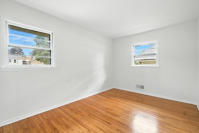 1464 Kent St, Saint Paul, MN 55117 - empty room featuring baseboards and light wood-type flooring