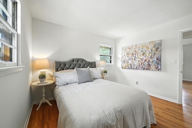 1464 Kent St, Saint Paul, MN 55117 - bedroom with baseboards and wood finished floors
