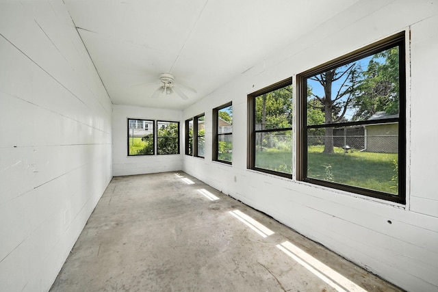 1464 Kent St, Saint Paul, MN 55117 - unfurnished sunroom with ceiling fan and concrete flooring