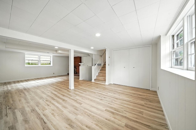 1464 Kent St, Saint Paul, MN 55117 - below grade area with stairway, light wood finished floors, and recessed lighting