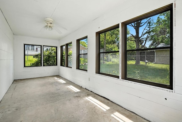 1464 Kent St, Saint Paul, MN 55117 - unfurnished sunroom with ceiling fan, healthy amount of natural light, and unfinished concrete flooring