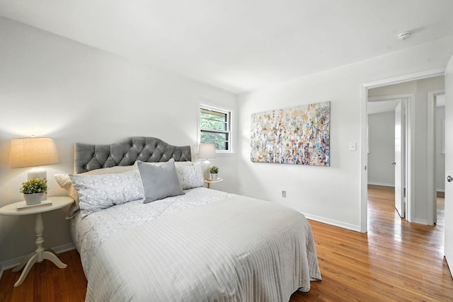 1464 Kent St, Saint Paul, MN 55117 - bedroom featuring wood finished floors and baseboards