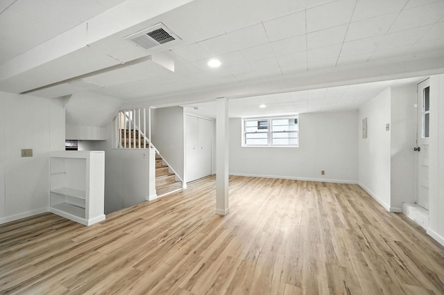 1464 Kent St, Saint Paul, MN 55117 - basement featuring light wood-style floors, stairway, and recessed lighting