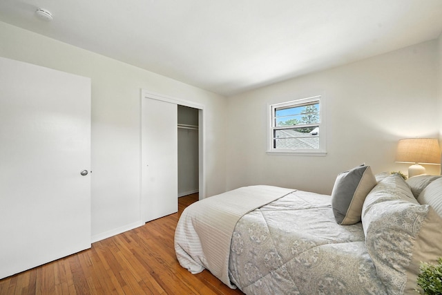 1464 Kent St, Saint Paul, MN 55117 - bedroom featuring hardwood / wood-style flooring and a closet