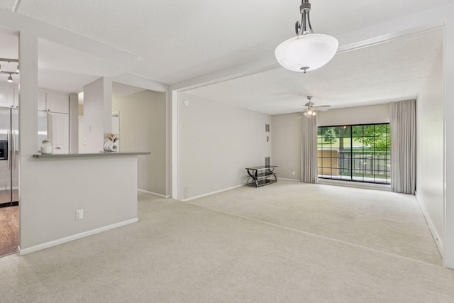 6650 Vernon Ave S Unit 111, Edina, MN 55436 - unfurnished living room featuring light colored carpet and ceiling fan