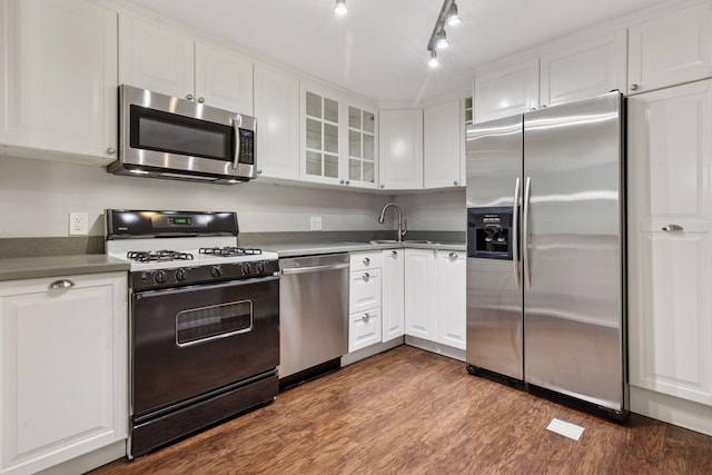 6650 Vernon Ave S Unit 111, Edina, MN 55436 - kitchen with appliances with stainless steel finishes, white cabinets, and glass insert cabinets