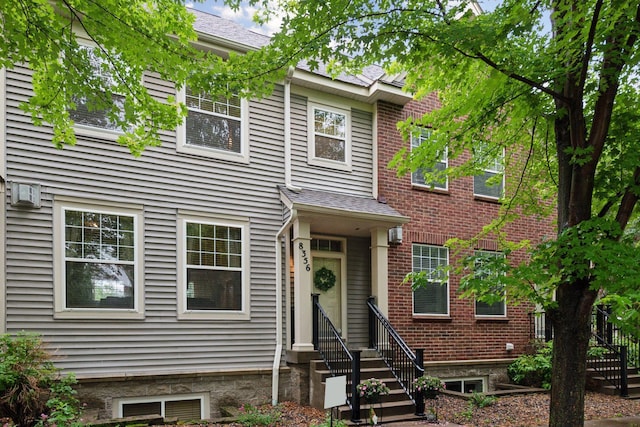 8356 Townsend Dr, Eden Prairie, MN 55344 - view of front of home with entry steps and brick siding