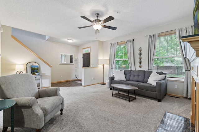8356 Townsend Dr, Eden Prairie, MN 55344 - carpeted living area featuring a ceiling fan and a textured ceiling