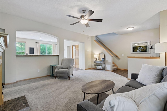 8356 Townsend Dr, Eden Prairie, MN 55344 - living room featuring a ceiling fan, stairs, and a textured ceiling