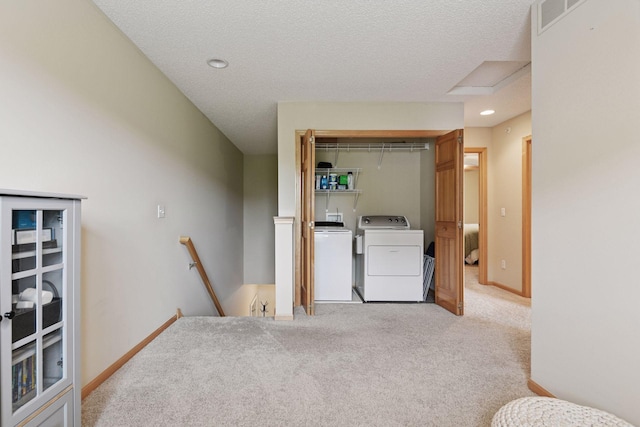 8356 Townsend Dr, Eden Prairie, MN 55344 - laundry area featuring washer and clothes dryer, carpet floors, a textured ceiling, and recessed lighting
