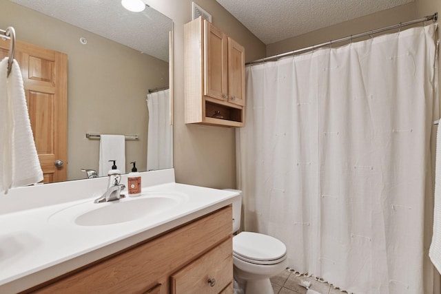 8356 Townsend Dr, Eden Prairie, MN 55344 - full bathroom with a textured ceiling, vanity, tile patterned floors, and a shower with shower curtain
