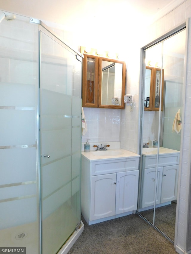 37452 Deer St, Aitkin, MN 56431 - full bathroom featuring vanity, tasteful backsplash, and a stall shower