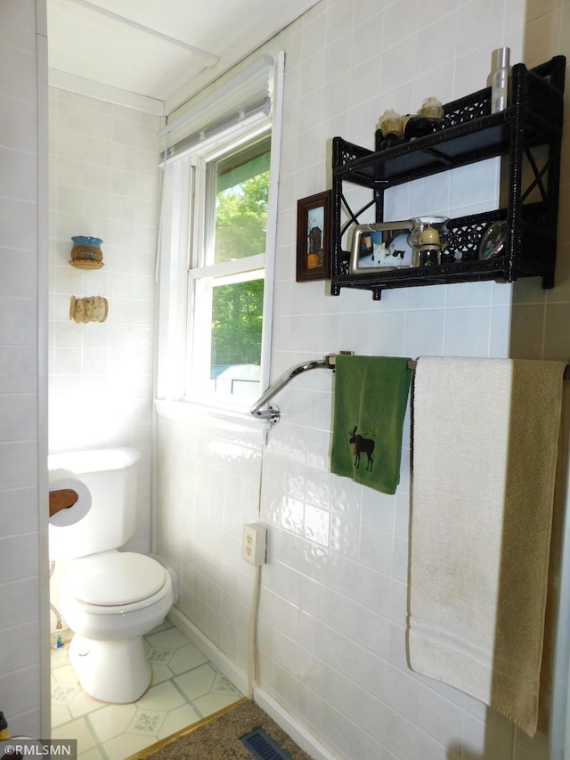 37452 Deer St, Aitkin, MN 56431 - bathroom featuring tile walls and tile patterned flooring