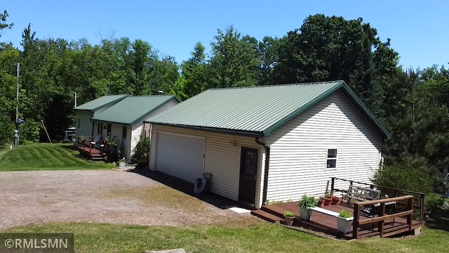 37452 Deer St, Aitkin, MN 56431 - detached garage featuring driveway