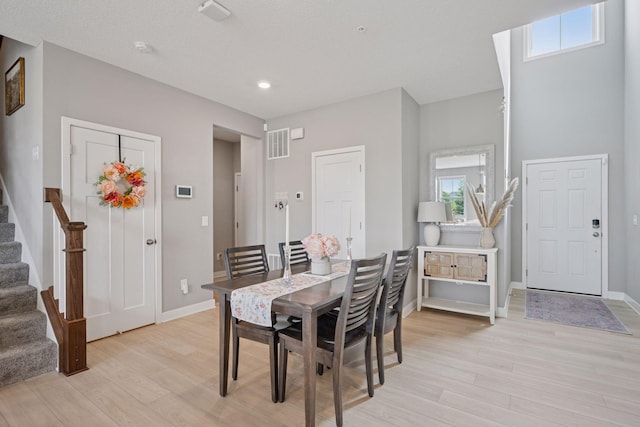 18874 72nd Pl N, Maple Grove, MN 55311 - dining room featuring stairs, light wood-style floors, and recessed lighting