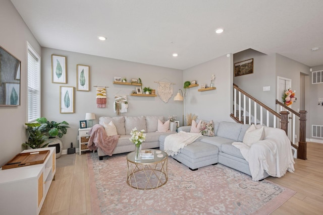 18874 72nd Pl N, Maple Grove, MN 55311 - living area featuring light wood-style flooring, stairway, and recessed lighting