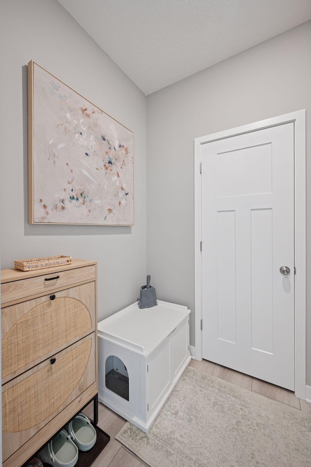 18874 72nd Pl N, Maple Grove, MN 55311 - washroom with light wood-style floors and baseboards