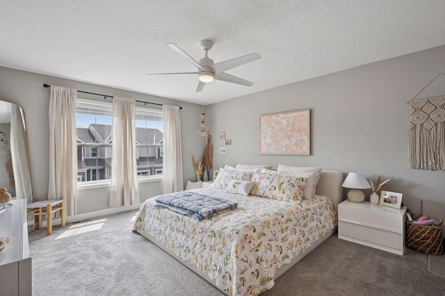 18874 72nd Pl N, Maple Grove, MN 55311 - bedroom featuring carpet flooring, ceiling fan, and a textured ceiling