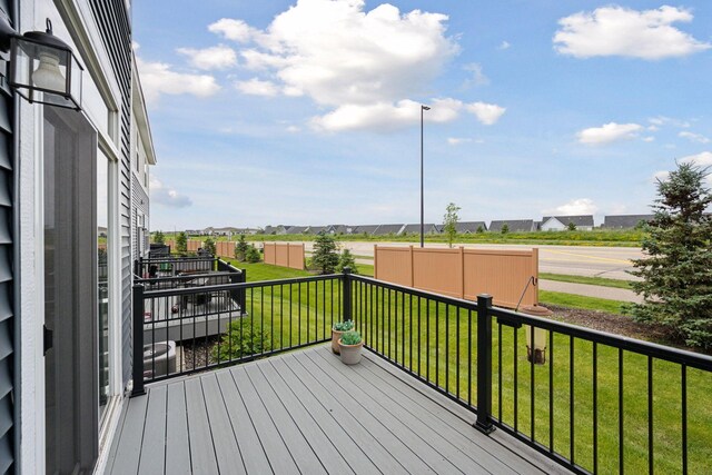18874 72nd Pl N, Maple Grove, MN 55311 - wooden deck featuring a lawn and a residential view