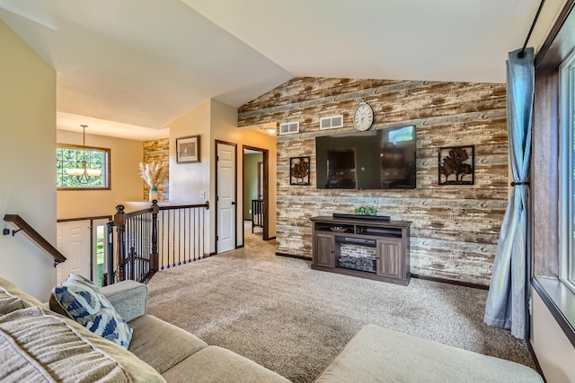 40224 Golden Way, North Branch, MN 55056 - living room featuring carpet floors, lofted ceiling, and a chandelier
